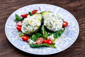 avocado stuffed with cottage cheese and herbs