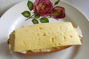Sandwich with butter and cheese. Calorie content 1 piece per 100 grams, proteins, fats, carbohydrates 