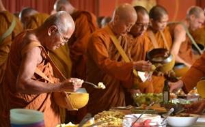 What do the inhabitants of Buddhist monasteries eat?