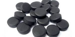 Black activated carbon tablets