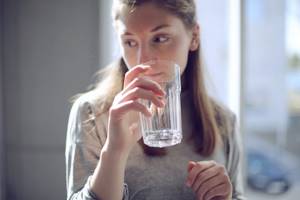 girl holding a glass