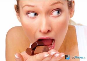 Girl eating chocolate