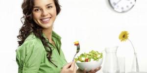 Girl with a plate of salad