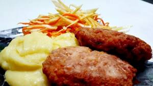 Homemade cutlets with minced pork loaf and milk