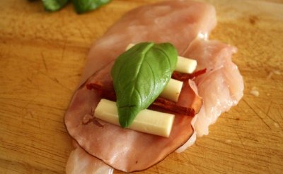 Stuff the breast with cheese and ham