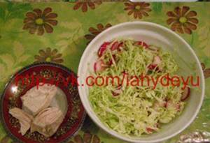 Photo of a meal of chicken breast, as well as a salad of radishes, cabbage and kefir