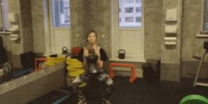 Deep squats with a kettlebell
