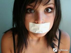 Adhesive tape pasted on girl&#39;s mouth
