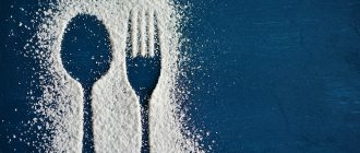 Spoon and fork covered in sugar