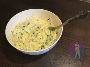 bowl with grated zucchini and egg whites