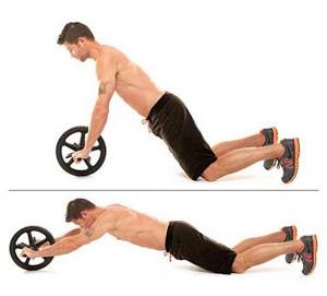 a man pumps up his abs using a roller