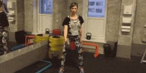 Lifting a kettlebell onto the shoulder