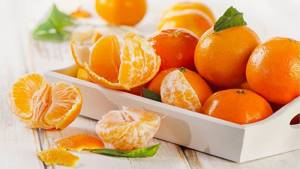 Польза и вред мандаринов для здоровья, энергетическая ценность и правила употребления
