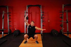 squats with two kettlebells
