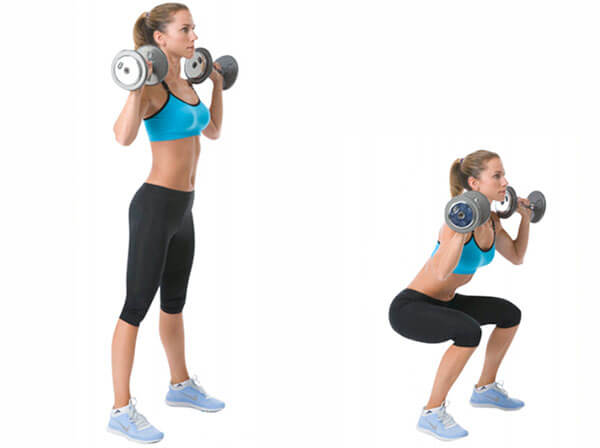 squats with dumbbells at the shoulders