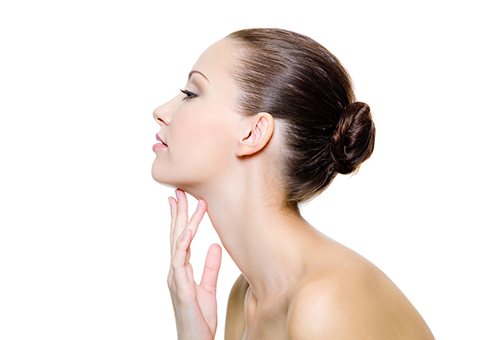 Profile of a girl with a long neck