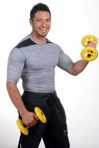 Pumping up biceps with dumbbells: exercises for arms