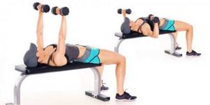 Lifting with dumbbells lying down
