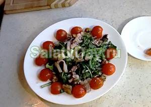 Salad with sea cocktail and arugula