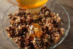 Mixture of dried apricots prunes honey