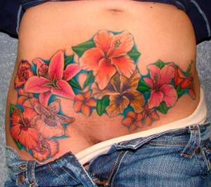 Tattoo on the stomach to disguise a cesarean section scar