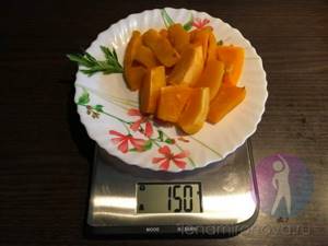 pumpkin on a plate on a kitchen scale