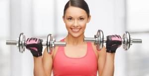 Exercises with dumbbells on the chest for girls in the gym, at home