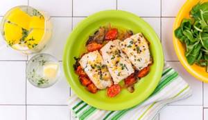 Baked hake with vegetables