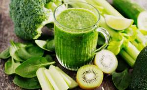 Green smoothie with kiwi, celery and cucumber for weight loss